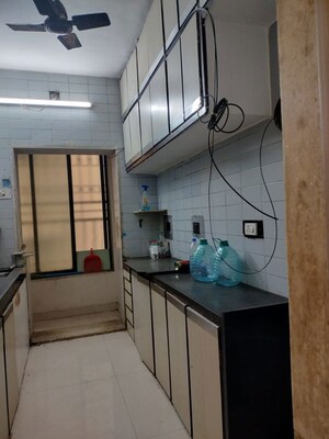 Kitchen in 2 BHK Apartment at Tushar Apartments, Santacruz West – for Rent