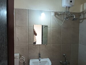 Bathroom in 3 BHK Apartment at Venkateshwara Silver Moon, Baner – for Rent