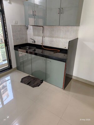 Kitchen in 1.5 BHK Apartment at Haware Estate, Kasarvadavali – for Rent