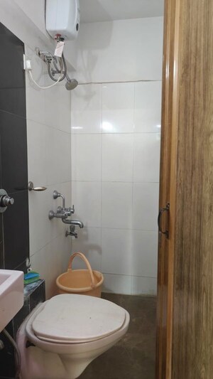 Bathroom in 2 BHK Apartment at Sai Baba Vihar Complex, Ghodbunder Road – for Rent