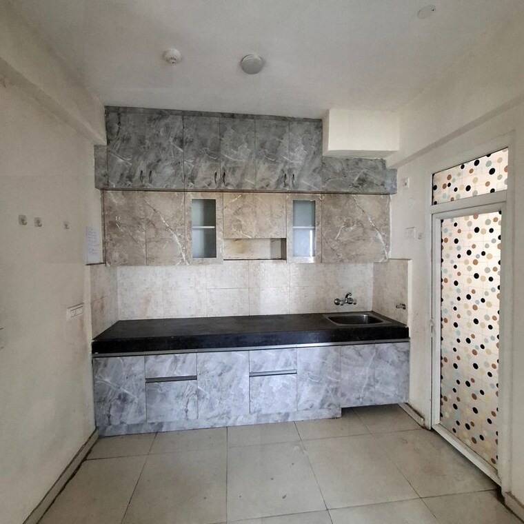 Kitchen, signature-global-the-millennia 2 Bedroom 800 Sq.Ft. Apartment In Sector 37d Gurgaon 10609795