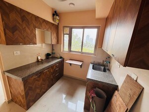 Kitchen in 2 BHK Apartment at Piramal Vaikunth A Class Homes, Balkum Pada – for Rent