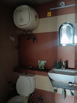 Bathroom in 2 BHK Apartment at Mahagun My Woods, Sector 16c Greater Noida – for Rent
