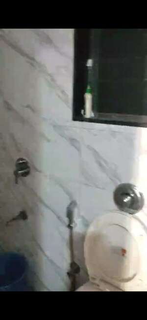 Bathroom in 1 BHK Apartment at UK Iridium, Kandivali East – for Rent