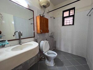 Bathroom in 4 BHK Apartment at Prestige Langleigh, Whitefield – for Rent