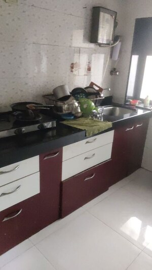 Kitchen in 2 BHK Apartment at Goyal Lakshchandi Heights, Goregaon East – for Rent