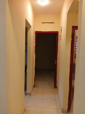 Building Lobby in 1 BHK Apartment at Shubharambh Complex, Manpada – for Rent