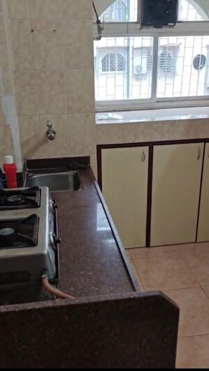 Kitchen in 1 BHK Apartment at Green Fields Apartment, Andheri East – for Rent