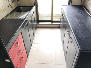 Kitchen in 2 BHK Apartment at Kshitij CHS Sanpada, Sanpada – for Rent
