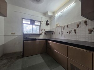 Kitchen in 3 BHK Apartment at Doordarshan CHS, Goregaon East – for Rent