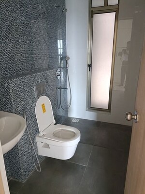 Bathroom in 3 BHK Apartment at Raj Infinia, Malad West – for Rent