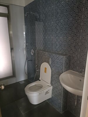 Bathroom in 4 BHK Apartment at Raj Infinia, Malad West – for Rent
