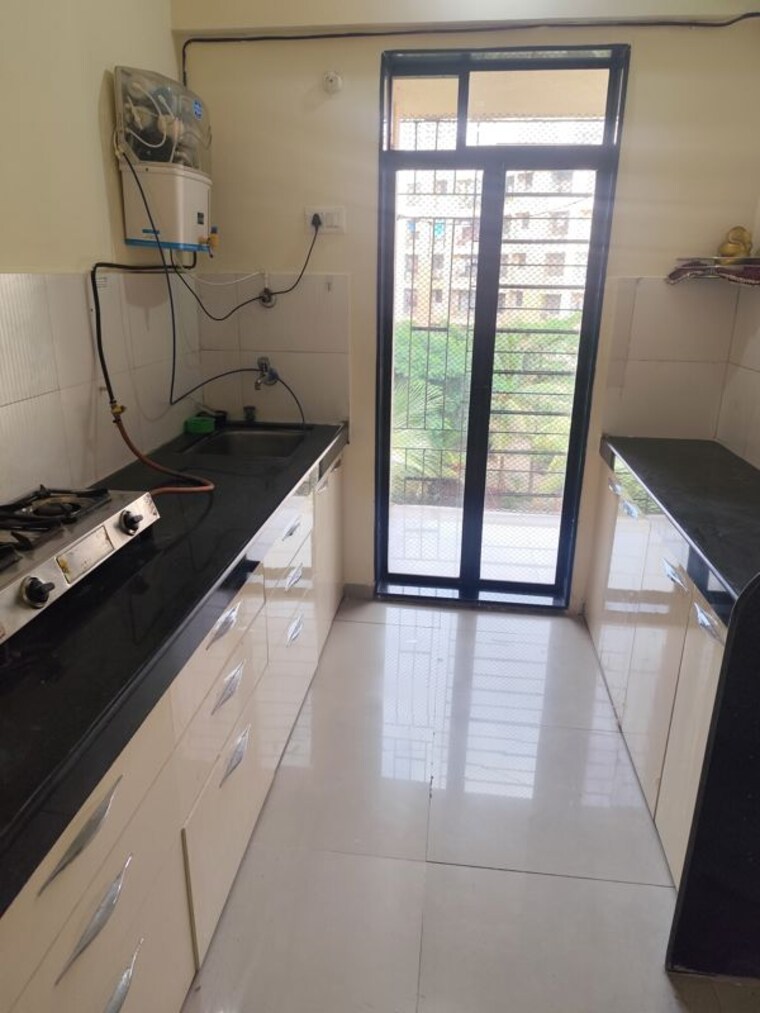 Kitchen, squarefeet-grand-square 1 Bedroom 850 Sq.Ft. Apartment In Anand Nagar Thane 10610177