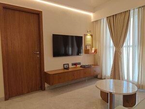 Living Room in 1 BHK Apartment at Siddha Sky, Sion – for Rent
