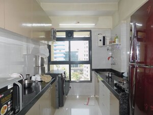 Kitchen in 2 BHK Apartment at OM Elegance, Malad West – for Sale