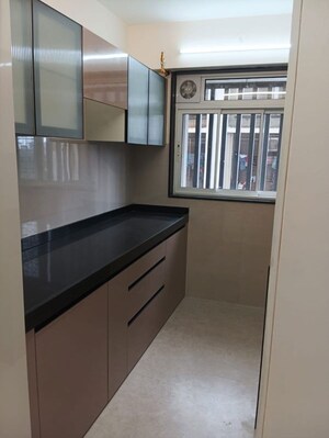 Kitchen in 1.5 BHK Apartment at Rustomjee Cleon, Bandra East – for Rent