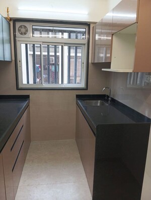 Kitchen in 1.5 BHK Apartment at Rustomjee Cleon, Bandra East – for Rent