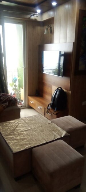 Living Room in 4 BHK Apartment at Parker White Lily, Sector 8 – for Sale