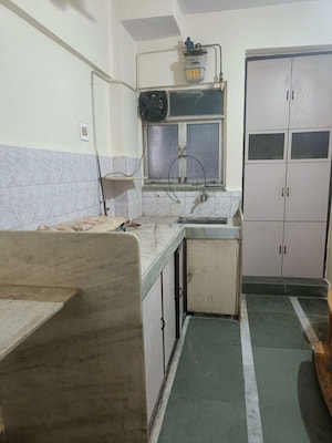 Kitchen in 2 BHK Apartment at Rutu Towers, Ghodbunder Road – for Rent