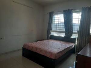 Bedroom in 3 BHK Apartment at Kolte Patil Tuscan Estate, Kharadi – for Rent