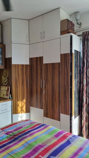Bedroom in 2 BHK Apartment at Konark Elegance, Wadgaon Sheri – for Rent