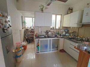 Kitchen in 3 BHK Apartment at Marvel Zephyr, Kharadi – for Rent