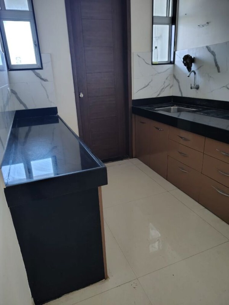 Kitchen, unique-k-pune 3 Bedroom 1400 Sq.Ft. Apartment In Bavdhan Pune 10610362