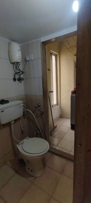 Bathroom in 2 BHK Apartment at Shanti Gardens , Mira Road – for Rent