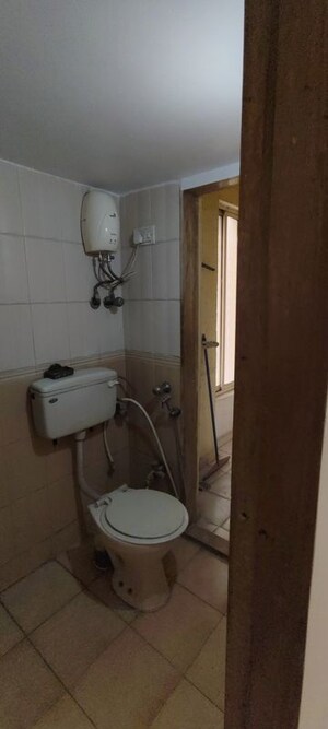 Bathroom in 2 BHK Apartment at Shanti Gardens , Mira Road – for Rent