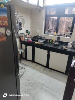 Kitchen in 1 BHK Apartment at Queens Land Apartment, Andheri West – for Sale