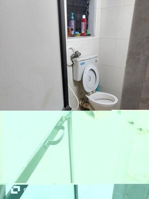 Bathroom in 1 BHK Apartment at Queens Land Apartment, Andheri West – for Sale