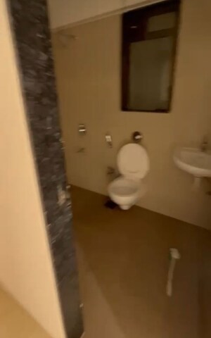 Bathroom in 1 BHK Apartment at Pancsheel CHS, Malad East – for Rent