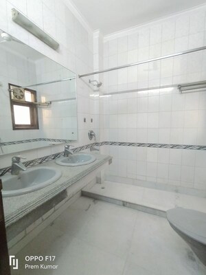 Bathroom in 4 BHK Apartment at Amar Colony – for Rent