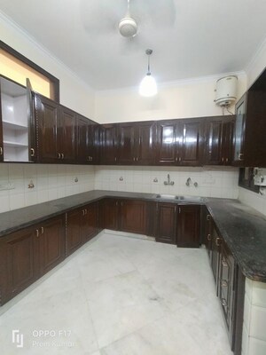 Kitchen in 4 BHK Apartment at Amar Colony – for Rent