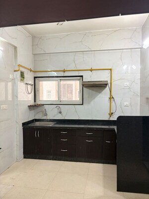 Kitchen in 3 BHK Apartment at Prahlad Nagar – for Rent
