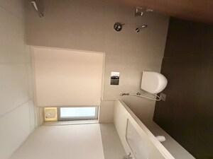 Bathroom in 2 BHK Apartment at Piramal Vaikunth, Balkum Pada – for Rent