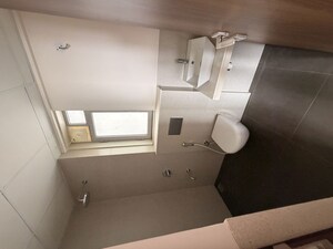 Bathroom in 2 BHK Apartment at Piramal Vaikunth, Balkum Pada – for Rent