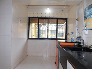 Kitchen in 2 BHK Apartment at New Life Society Apartment, Kurla – for Rent