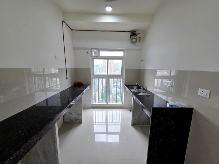 Kitchen, l-t-rejuve-360-tower-a 2.5 Bedroom 970 Sq.Ft. Apartment In Mulund West Mumbai 10610905