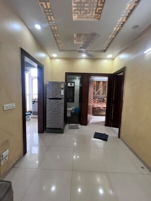 Living Room in 2.5 BHK Apartment at Mahagun My Woods, Sector 16c Greater Noida – for Rent
