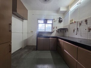 Kitchen in 3 BHK Apartment at Gokuldham Complex, Goregaon East – for Rent
