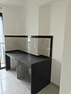 Kitchen in 2 BHK Apartment at Dhamji Shamji Mahavir Spring Tulip Phase 1, Pokhran Road No Two – for Rent