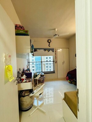 Living Room in 2 BHK Apartment at Rustomjee Azziano Wing E, Thane West – for Sale
