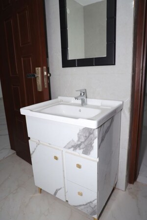 Bathroom in 4 BHK Apartment at Vasant Kunj – for Rent