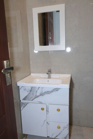 Bathroom in 4 BHK Apartment at Vasant Kunj – for Rent