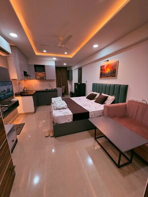Team Area in Studio Apartment at Okay Plus Solitaire Suites, Ramnagariya – for Rent