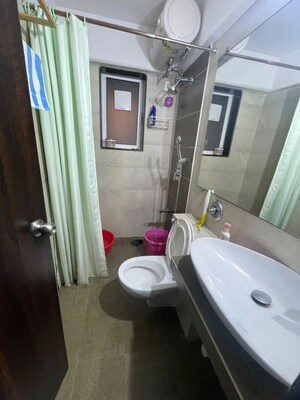 Bathroom in 2 BHK Apartment at Hubtown Hill Crest, Andheri East – for Rent