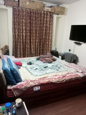 Bedroom in 2 BHK Apartment at Raichandani Megha Terrace CHS, Aundh – for Rent