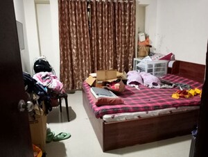 Bedroom in 2 BHK Apartment at Raichandani Megha Terrace CHS, Aundh – for Rent