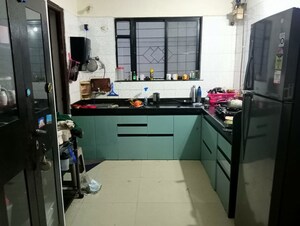Kitchen in 2 BHK Apartment at Raichandani Megha Terrace CHS, Aundh – for Rent